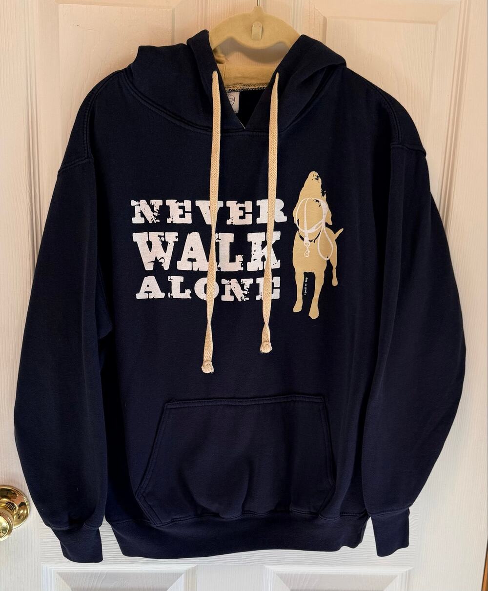 Navy blue graphic pullover hoodie chest print ("NEVER WALK ALONE"),NWOT